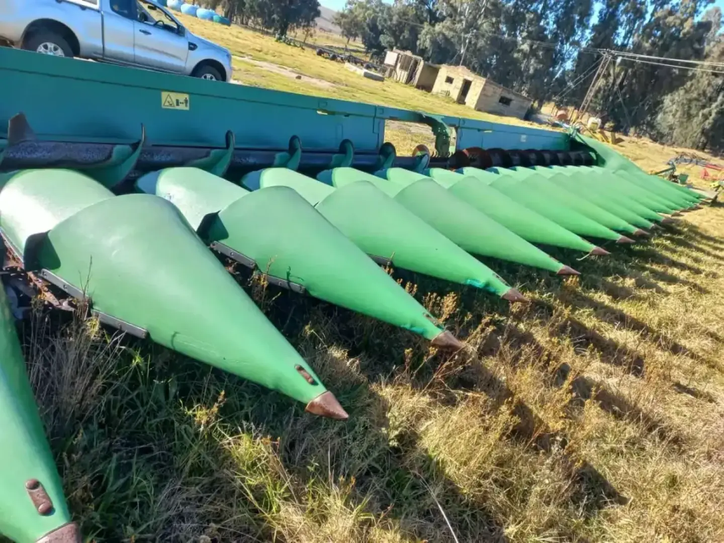 John Deere 616 C - 16 Row, 76 Picker Head | QAC Equipment